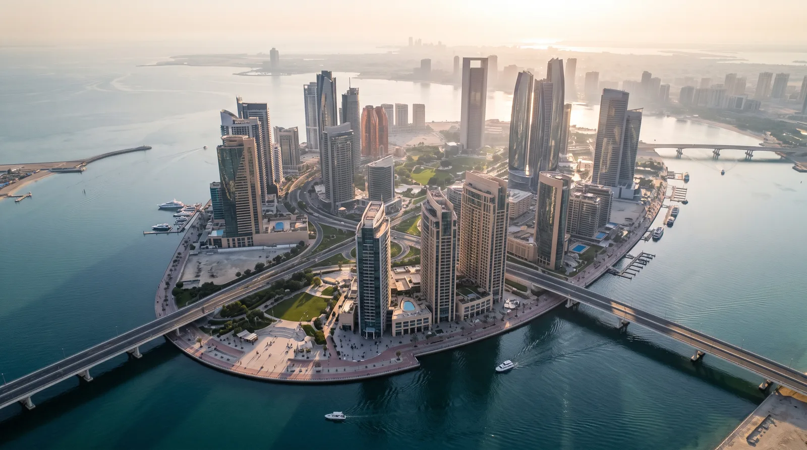Abu Dhabi’s island business district and the water around it at golden hour